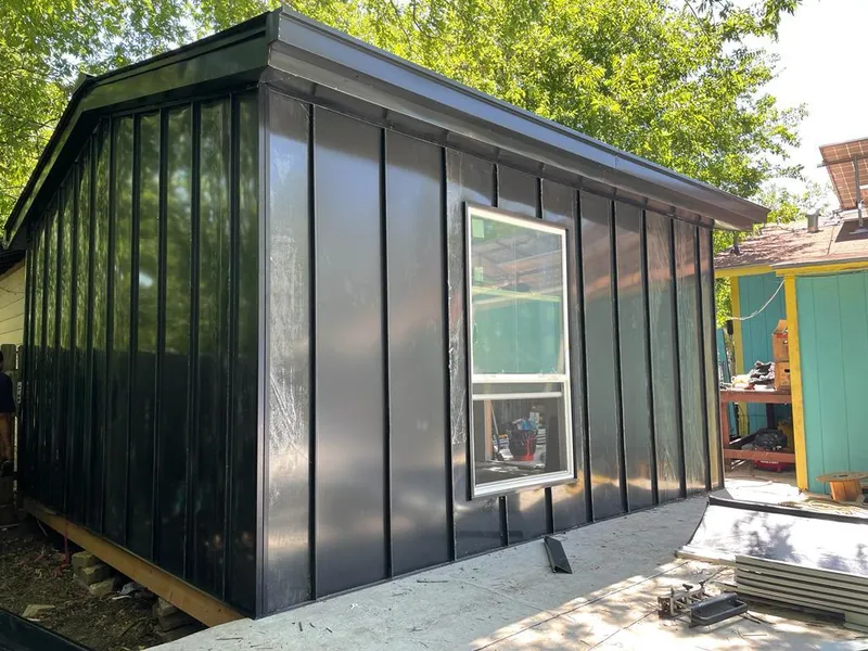 Black standing seam metal wall panels for Roof Inspection in Hampton